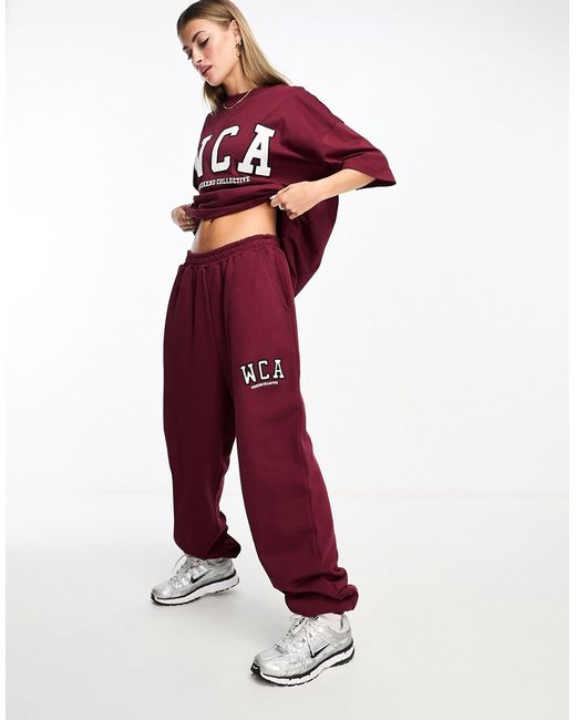 ASOS Weekend Collective oversized sweatpants with embroidered logo in  Púrpura