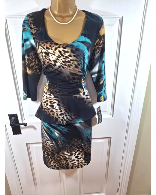 strapless open back dress Buy Ivory Floral Printed Peplum Suit Set in UK main image 1
