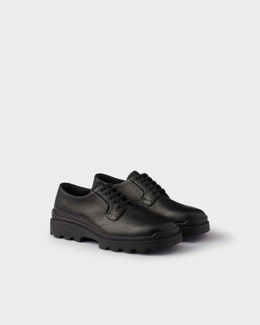 Prada Stamped leather derby shoes in Brown | Stylemi